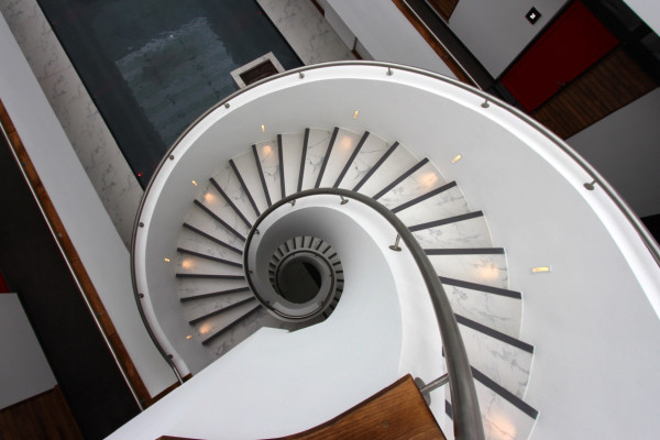 view from the top of completed helical spiral precast concrete staircase