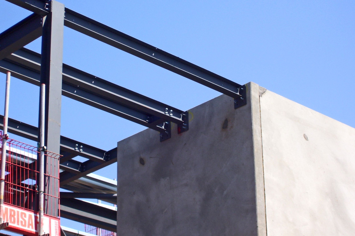 steel joinery onto precast concrete stair cores