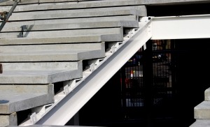 view of L-shaped precast concrete slabs on steelwork for stadium installation