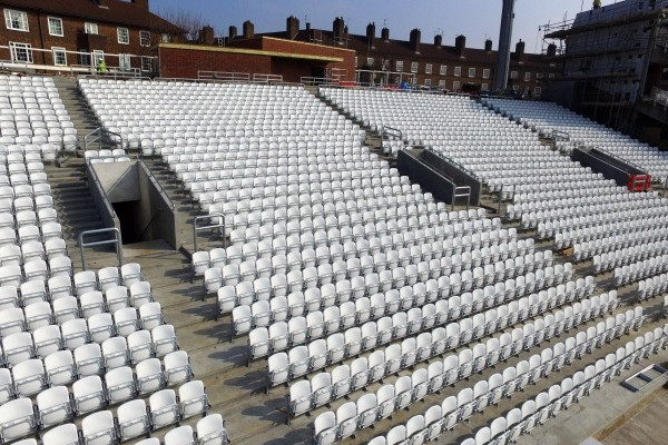 view of stadium chairs installed onto precast concrete slabs