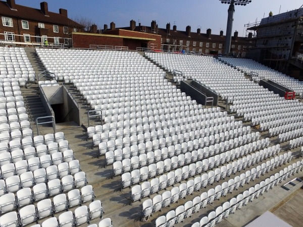 view of stadium chairs installed onto precast concrete slabs