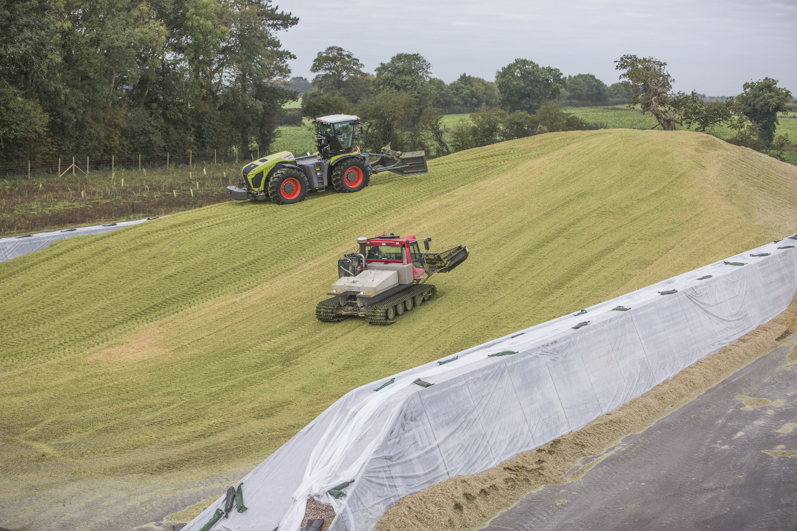 Tractors driving on silage in precast concrete silage clamps at Harper Adams University