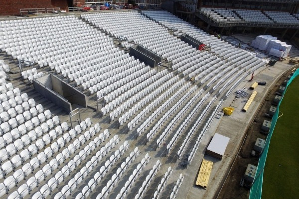 aerial view of stadium chairs installed onto precast concrete beams