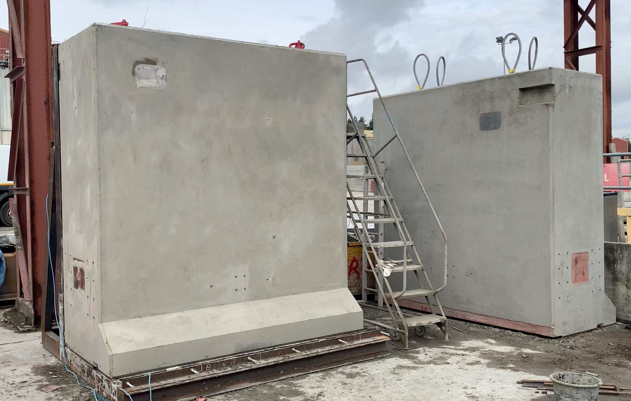 Bespoke precast concrete neutron shields in factory yard ready for delivery