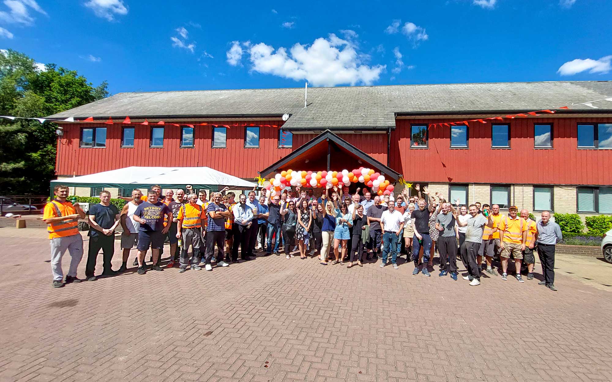 staff celebrate Milbank Concrete Products 75th year in business