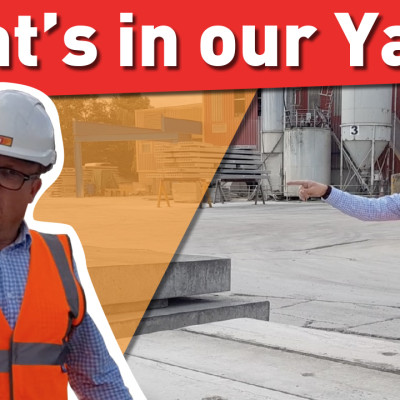 Mark Ellis poses for what's in our yard video pointing at concrete slab