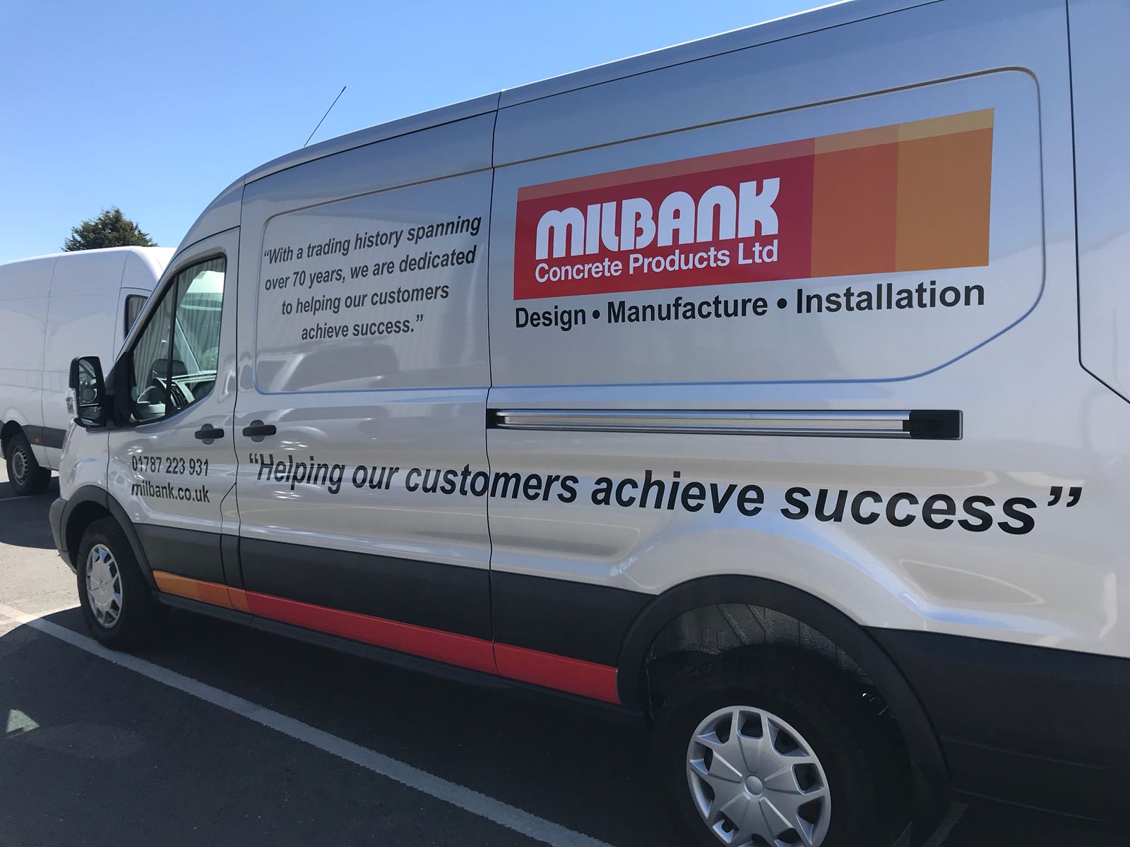 Milbank installation van with new vehicle graphics applied