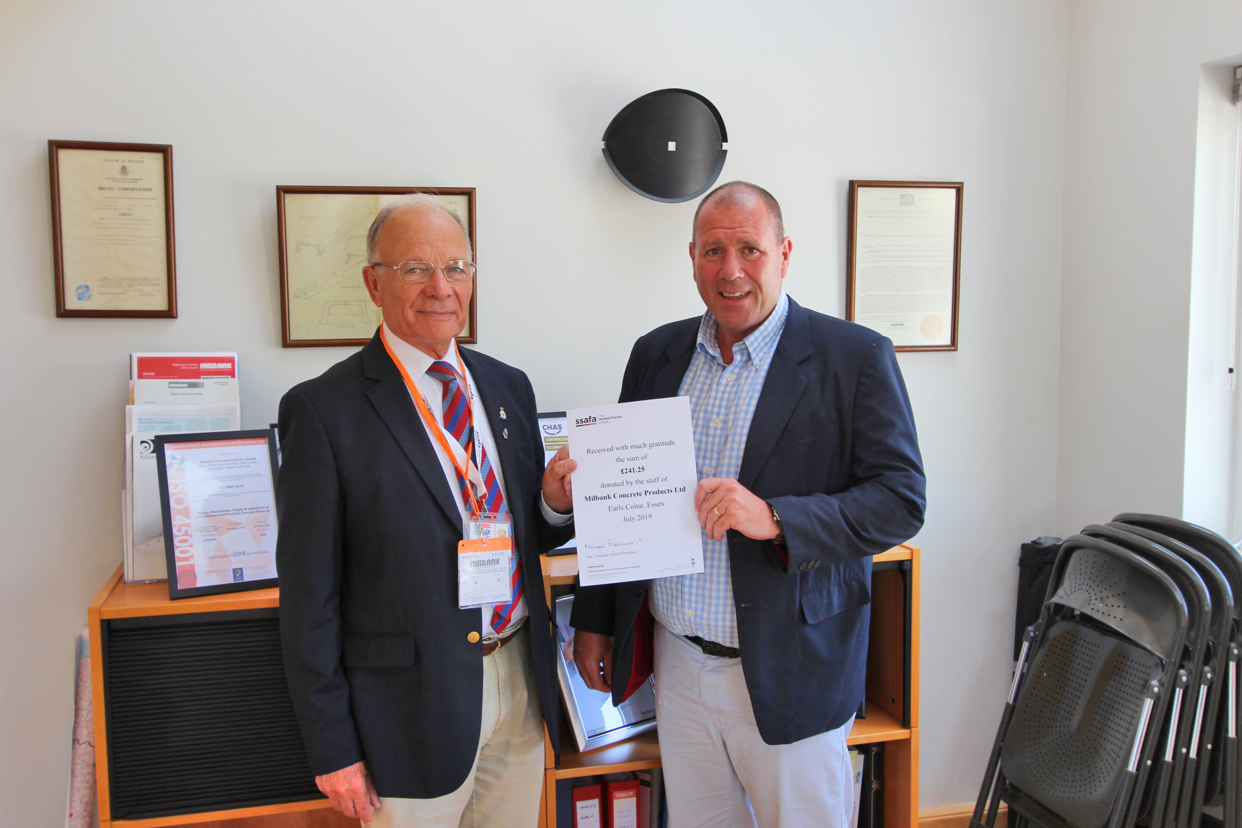 Andy Mayne hands £250 donation to SSAFA representative