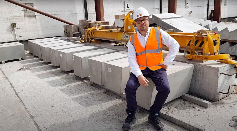 Mark Ellis sits on bespoke precast concrete seating units