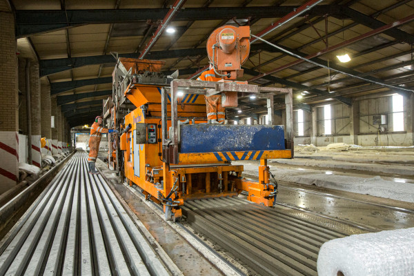 Working extruder in the precast concrete factory