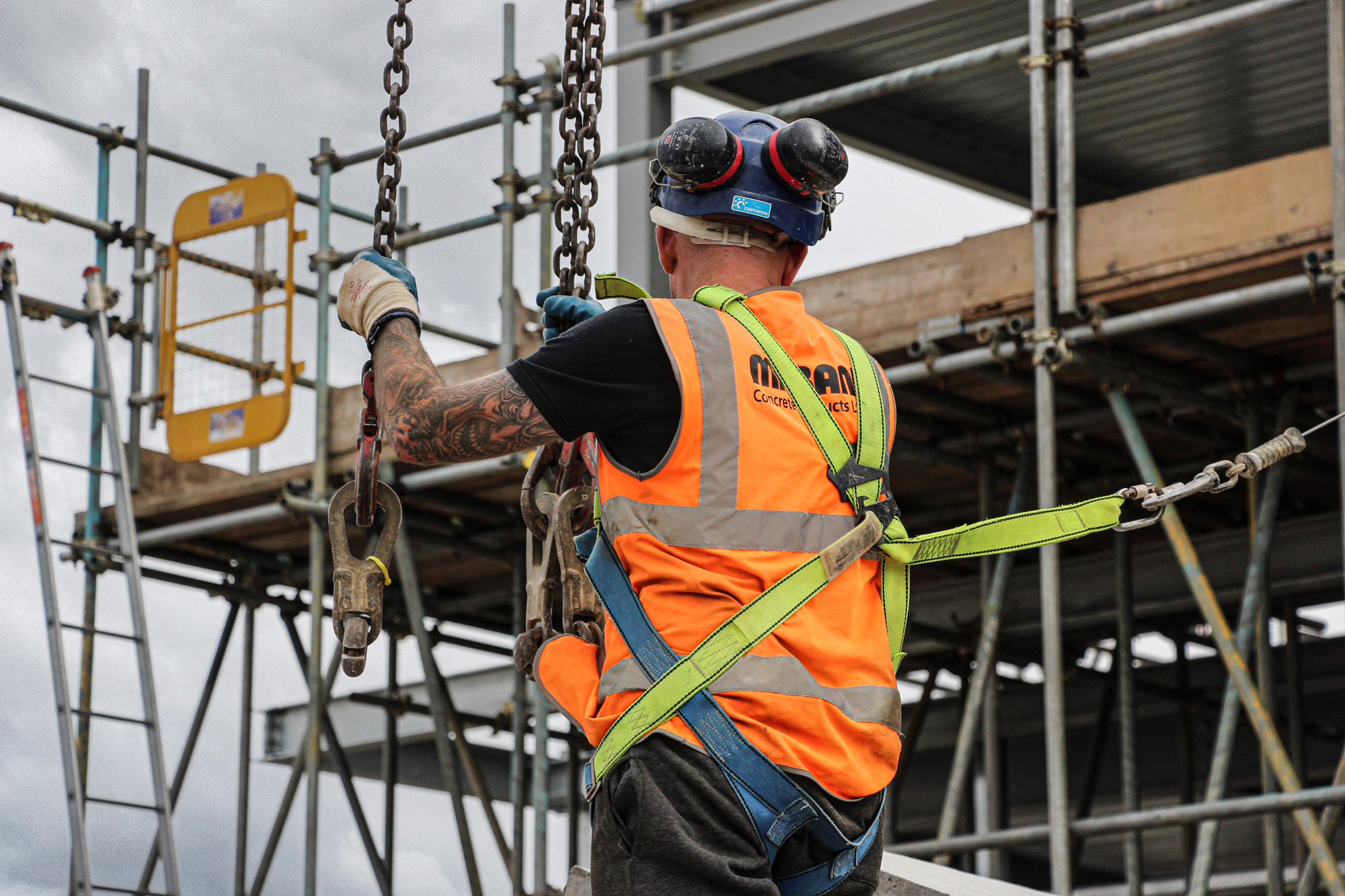 Milbank employee wearing health & safety equipment